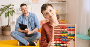 A compassionate carer with a smiling autistic child, illustrating quality respite care for children with autism.