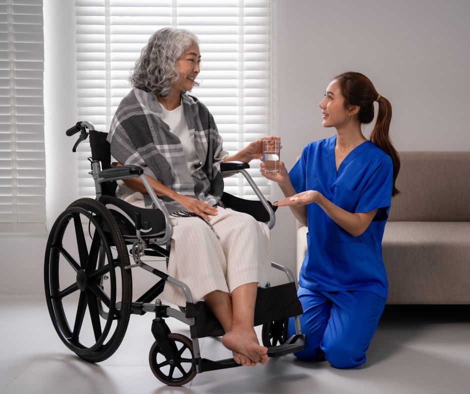 Carer giving medicine to patient at home during home care vs nursing care support